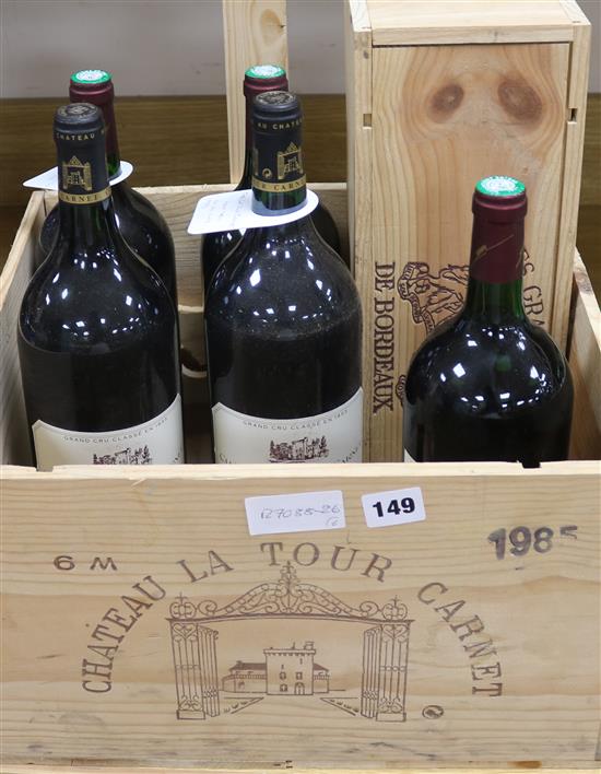 Two magnums of Chateau La Tour Carnet, 1985, three magnums of Puisseguin-St Emilion, 1997 and a boxed magnum of Haut Vignoble, 1990